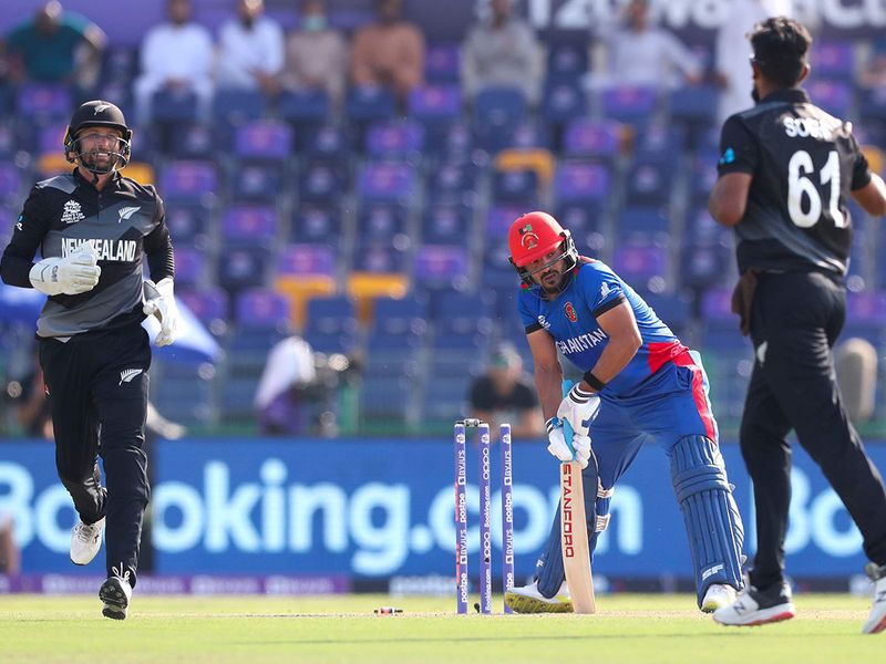 Afghanistan's Gulbadin Naib is dismissed by New Zealand's Ish Sodhi