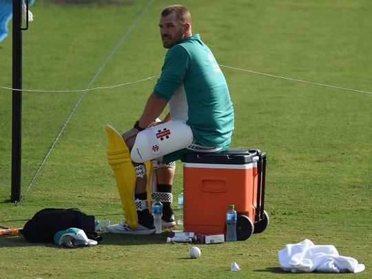 Australia's captain Aaron Finch takes a break during a practice session on Saturday, ahead of Sunday's T20 World Cup final match against New Zealand