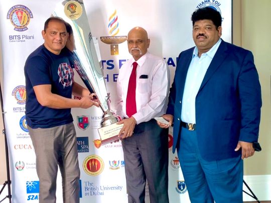 Mohammad Azharuddin, Prof. Srinivasan Madapusi, Director BPDC and Dr. M. Rafiuddin, Convener, BITS Pilani Sports Festival with the BSF trophy