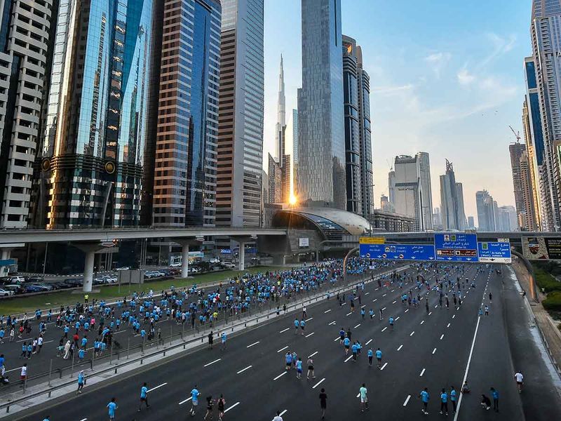 Residents taking part in the Dubai Run 30x30 on Sheikh Zayed Road