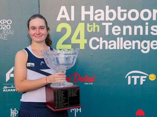 Daria Snigur with the Al Habtoor Tennis Challenge trophy