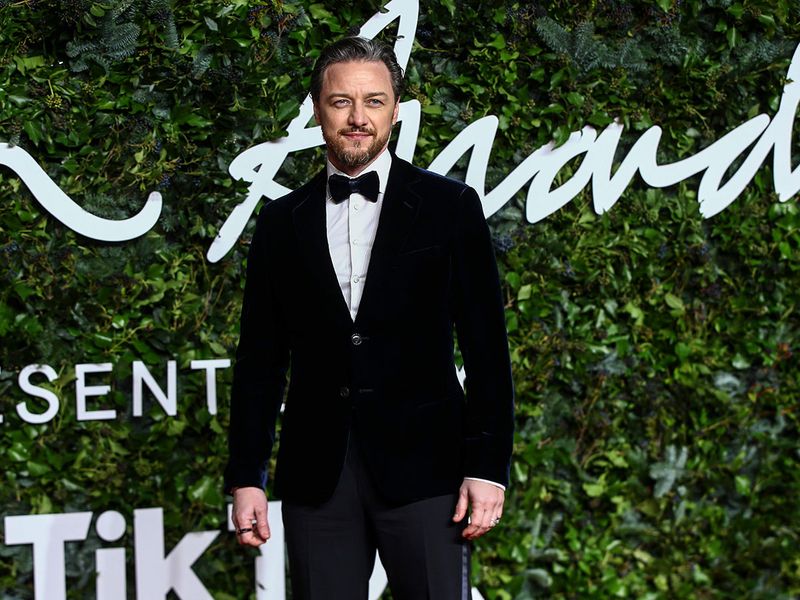James McAvoy poses for photographers upon arrival at the The Fashion Awards.