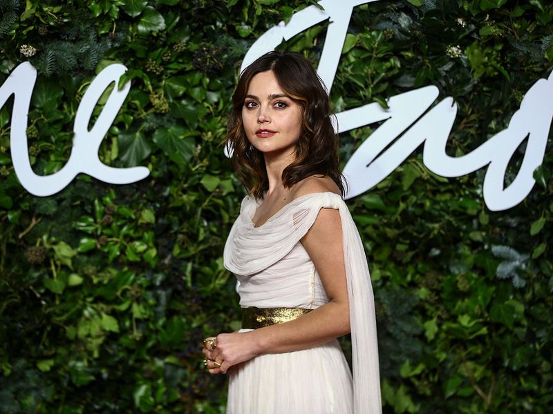 Jenna Coleman poses for photographers upon arrival at the The Fashion Awards.