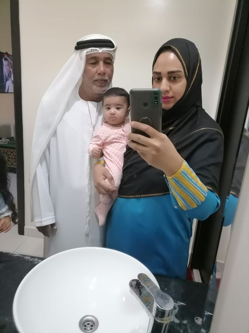 Baby Nasra with her parents-1638517664777