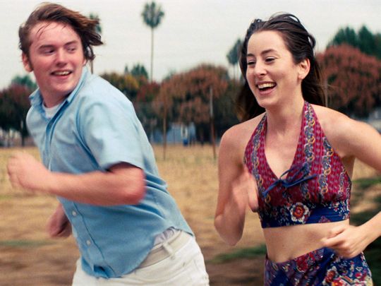 This image released by MGM shows Cooper Hoffman, left, and Alana Haim in a scene from 