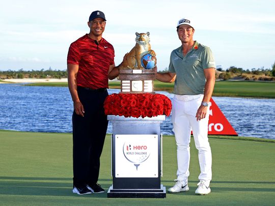Tiger Woods poses with Viktor Hovland the Norwegian won the Hero World Challenge at Albany Golf Course in Nassau