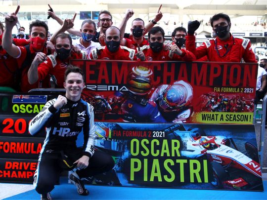 Oscar Piastri celebrates the Formula Two World Championship at Yas Marina Circuit 