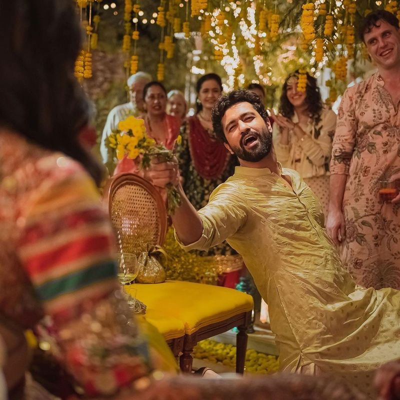 Kaushal puts on a performance for Kaif at the mehendi celebrations.