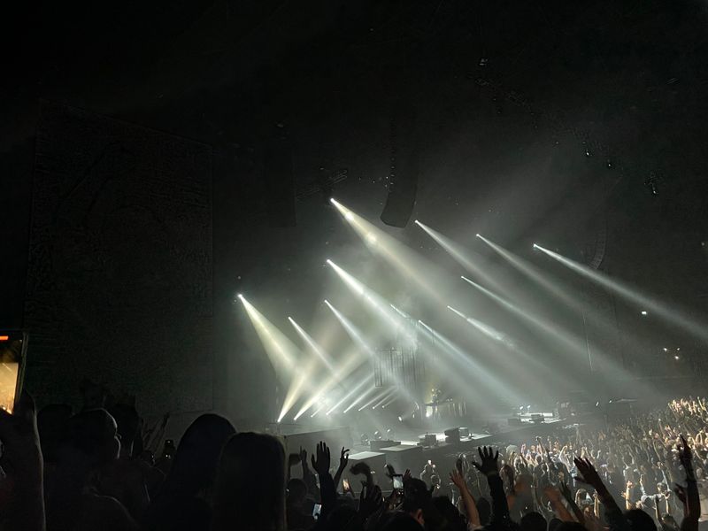 Laser beams hit the crowd as DJ Martin Garrix plays EDM