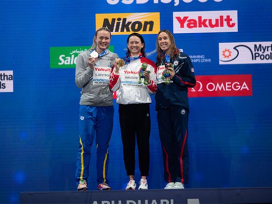 Siobhan Haughey set the championship record in 100m freestyle 