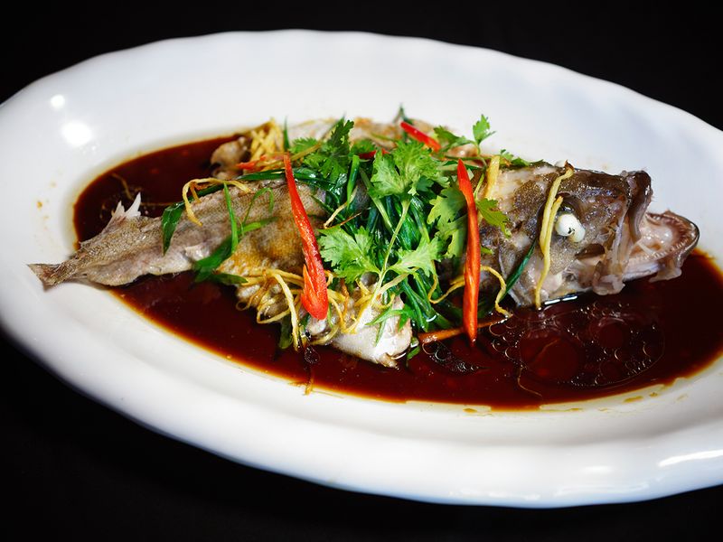 chinese-style-steamed-fish-in-soy-sauce-and-spring-onion