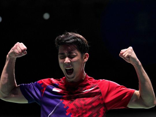 Singapore's Loh Kean Yew reacts after defeating India's Kidambi Srikanth during their badminton singles final match at the BWF World Championships in Huelva, Spain