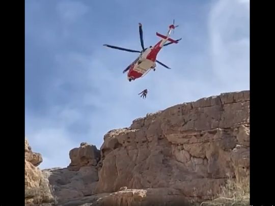 Screengrab of injured mountain climber being airlifted from mountain in Ras Al Khaimah on Tuesday
