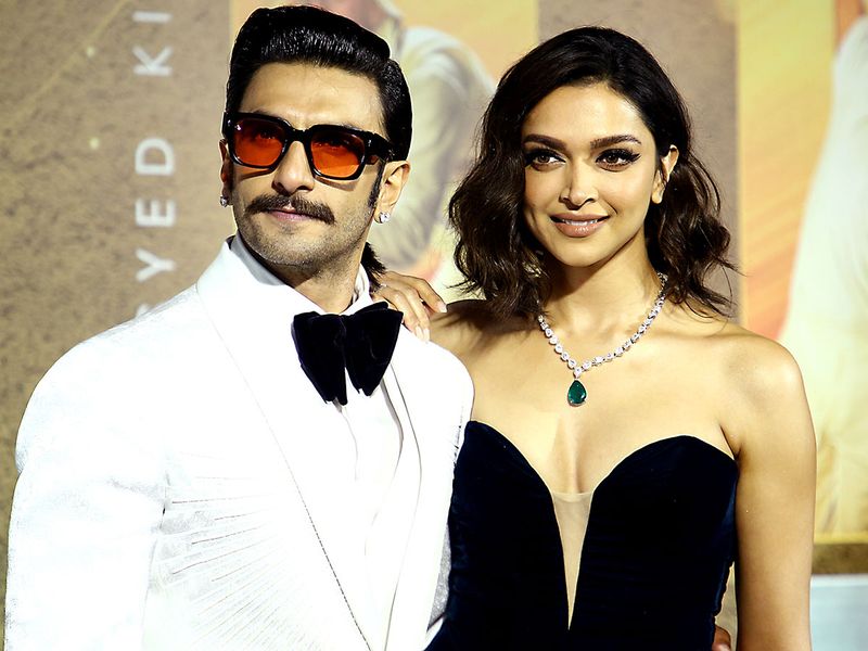 Bollywood actor Ranveer Singh with actress Deepika Padukone poses for a picture at the screening of the movie '83', in Mumbai on Wednesday