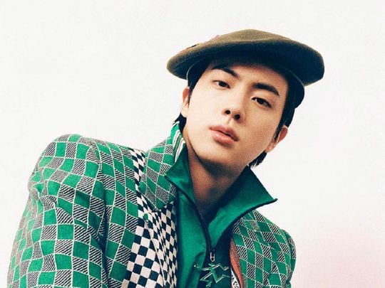 K-Pop group BTS’s member and Louis Vuitton ambassador Jin dons a look from LV Men SS22 Collection by the recently deceased Virgil 