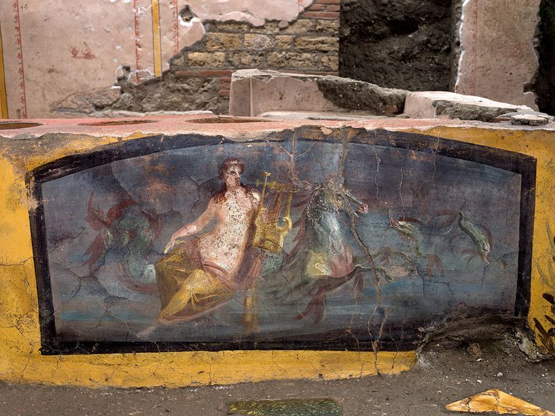 A fresco on an ancient counter depicting a nymph riding a horse uncovered during excavations in Pompeii. 