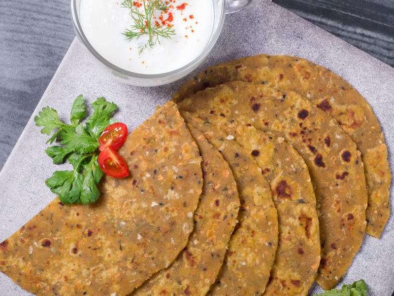 Vegetable stuffed paratha with mint chutney