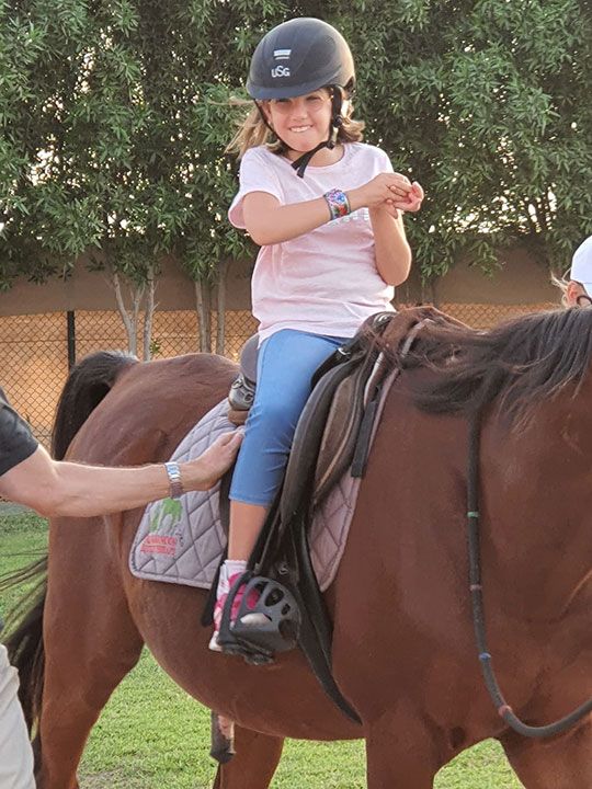 Sofia tries horse therapy