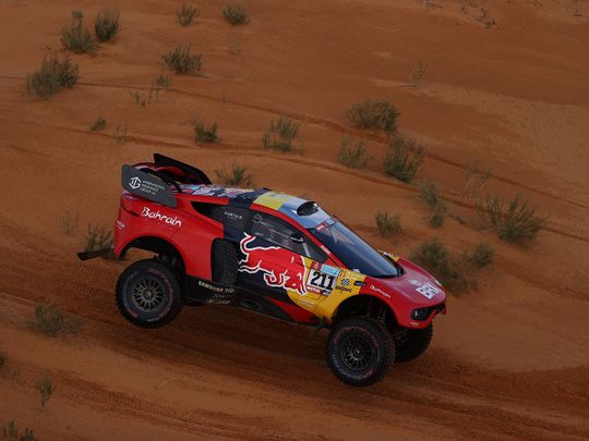 Bahrain Raid Xtreme's Sebastien Loeb and co-driver Fabian Lurquin in action 