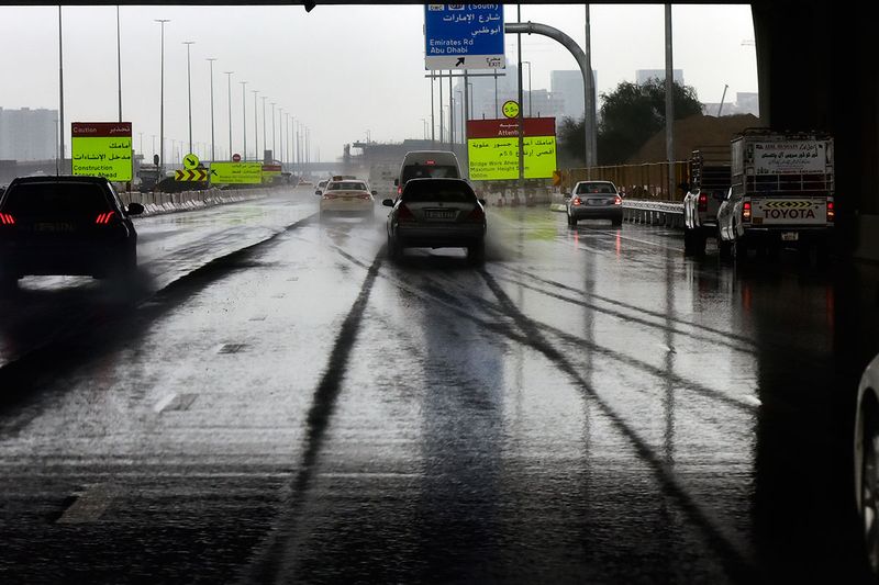 Heavy rain and puddles in Dubai cause a hinderance to motorists making their way to and from work on 3rd January, 2022. 