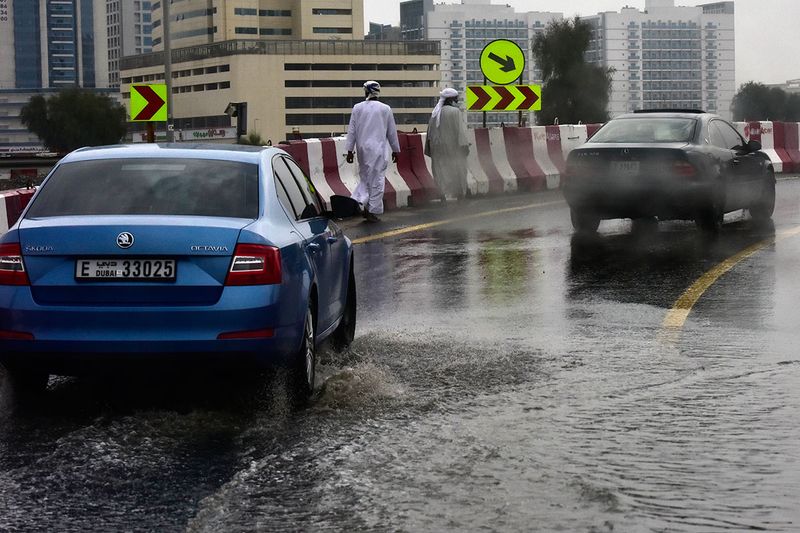 Heavy rain and puddles in Dubai cause a hinderance to motorists making their way to and from work on 3rd January, 2022