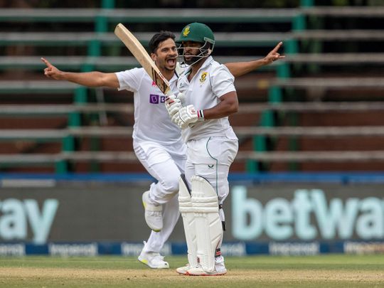South Africa's batsman Temba Bavuma, front, reacts after being dismissed India's Shardul Thakur
