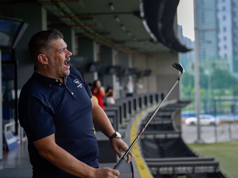 Director of Operations Mike Walton likes to relax on the range at Topgolf when hew is not busy with work