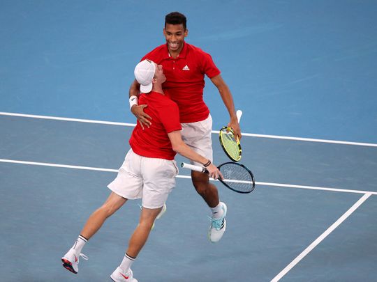 Canada's Felix Auger-Aliassime and Denis Shapovalov celebrate winning their semi final doubles match against Russia's Daniil Medvedev and Roman Safiullin 