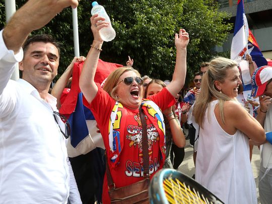 Fans of Serbia's Novak Djokovic react to news of his overturned ruling 