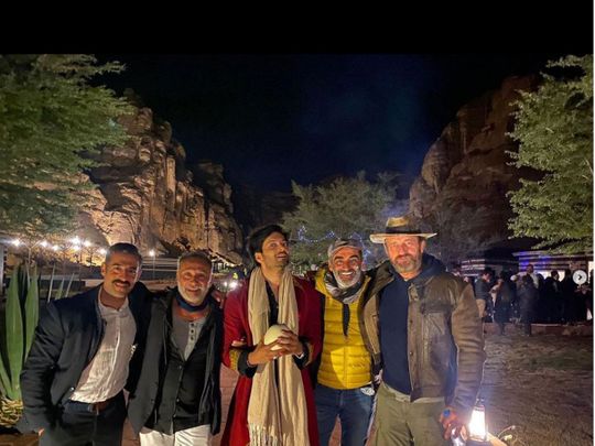 Ali  Fazal with Gerald Butler (right) and crew