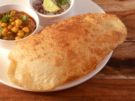 Bhature - a fluffy deep-fried sourdough Indian bread