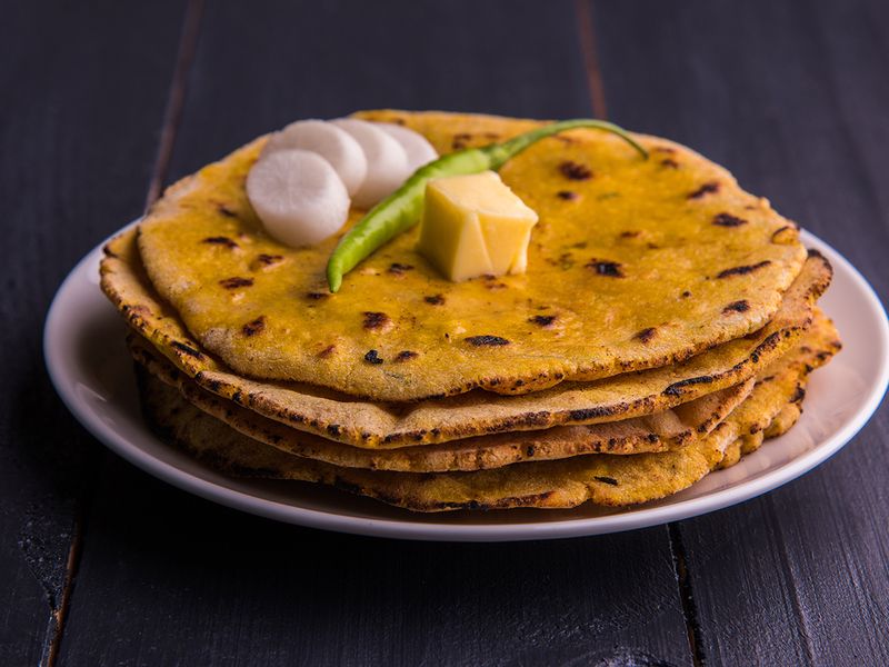 Makke ki roti or maize flour bread with butter. Image used for illustrative purpose only.