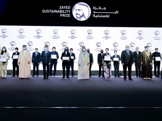 Sheikh Mohammed bin Rashid Al Maktoum (centre front) honouring winners of Zayed Sustainability Prize at Expo 2020 Dubai on Monday
