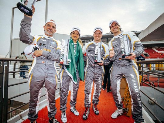 Reema Juffali with her Mercedes-AMG GT3teammates Valentin Pierburg, George Kurtzand and Ian Loggie at Dubai Autodrome.