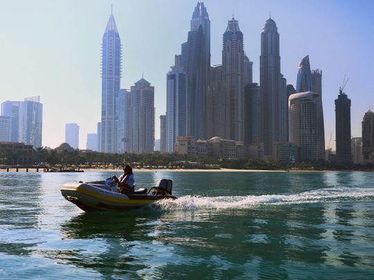 Captain a self-drive boat along the Dubai coastline