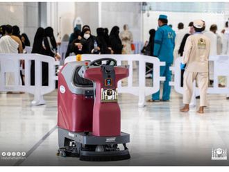 The robot in action at the Grand Mosque. 