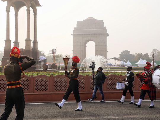 Army personnel carries torch lits with flame of Amar Jawan Jyoti