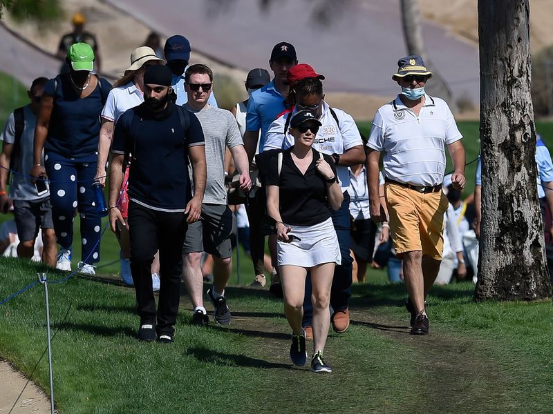 The fans follow their favourites at Emirates Golf Club
