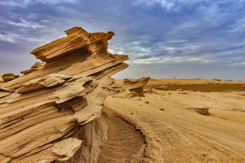 Al Wathba's twisting golden sand dunes 