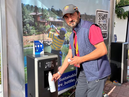 Akram Skaik, Director-General of the Emirates Golf Federation at one of the Hydration Stations at Al Hamra Golf Club at this week's Ras Al Khaimah Championship.