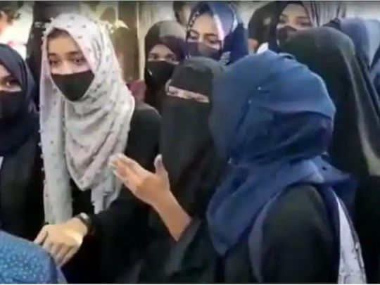 India: More colleges bar students wearing hijab, issue threatens ...