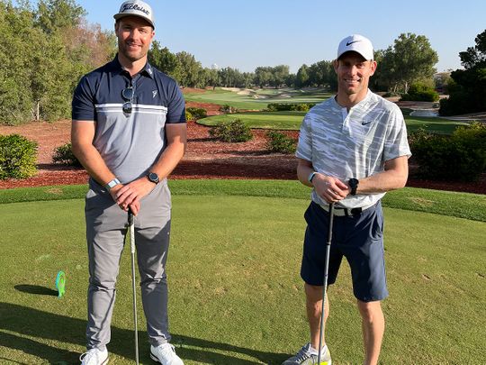 James Milner with Dubai-based coach Stephen Deane on the Earth Course at Jumeirah Golf Estates