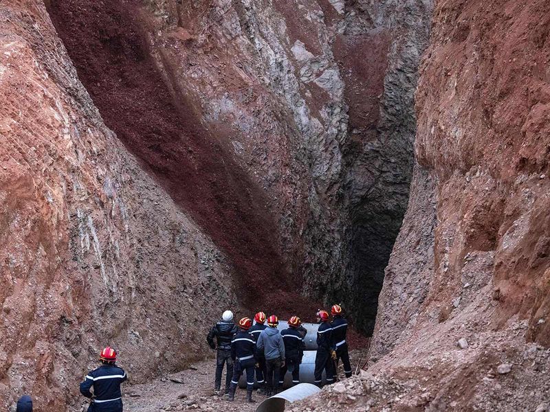 Moroccan emergency services teams work on the rescue of five-year-old boy Rayan from a well shaft he fell into, in Chefchaouen on February 5, 2022.  