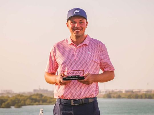 Winner of the Individual Pro title, Erik Lindwall (Swe) with his award at the recent Troon Abu Dhabi Pro-Am 