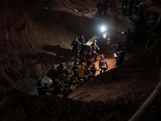 Rescue workers carry 5-year-old child, Rayan Awram, who has been trapped for five days in a well, to an ambulance, during a rescue operation near Chefchaouen, northern Morocco February 5, 2022,  February 5, 2022. 