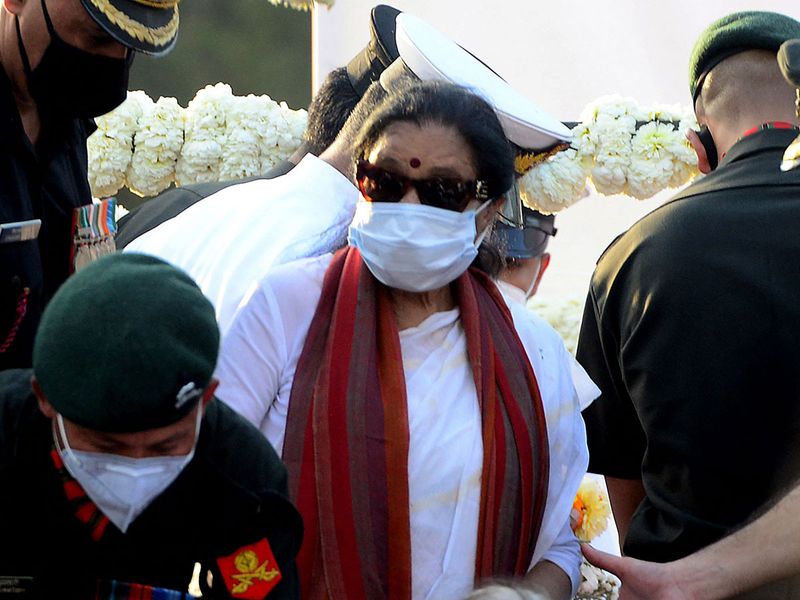 Playback singer Asha Bhosle attends the state funeral ceremony of late Bollywood singer Lata Mangeshkar who died in Mumbai on February 6, 2022.