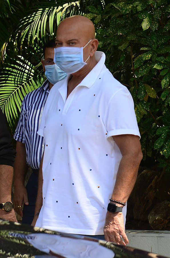 Bollywood director Rakesh Roshan arrives to pay his respect at the residence of late Bollywood singer-composer Bappi Lahiri in Mumbai on February 16, 2022. 
