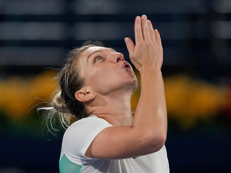 Simona Halep celebrates her win over Ons Jabeur