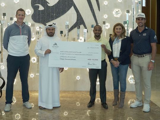 Sulaiman Baharoun, Director Partnerships and Sustainability at Al Jalila Foundation, Nihal Aboushousha, Manager, Partnerships & Sustainability, along with Rafa Cabrera Bello and officials from JA The Resort at the cheque presentation