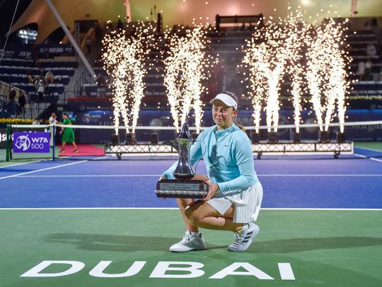 Jelena Ostapenko with the WTA Dubai Duty Free Tennis Championships singles trophy
